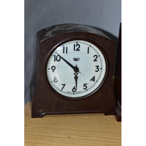 132 - THREE BROWN BAKELITE CASED ELECTRIC MANTEL CLOCKS, comprising a Ferranti, height 17.5cm, a Genolex w... 