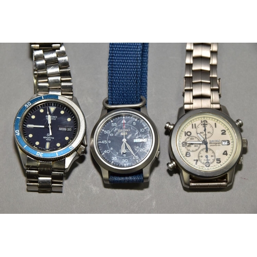 138 - THREE SEIKO WRISTWATCHES, the first ref 7T32-7D99, cream chronograph dial, Arabic numerals, date win... 