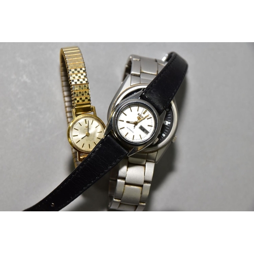 139 - THREE WRISTWATCHES, to include a Seiko automatic ref 7S26-3060, black dial with Arabic numerals, day... 