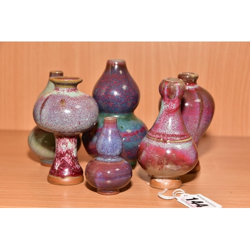 144 - SIX MINIATURE CHINESE STYLE VASES including meiping and double gourd shapes, mottled glazes, unmarke... 