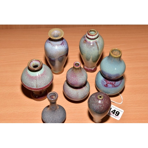 149 - SEVEN MINIATURE CHINESE STYLE VASES, shapes include baluster, double gourd and garlic mouth, mottled... 