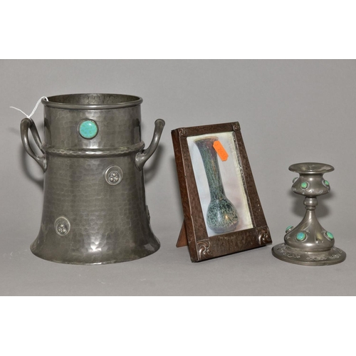 162 - AN ARTS AND CRAFTS PEWTER TWIN HANDLED WINE COOLER, of conical form, hand hammered finish, two circu... 