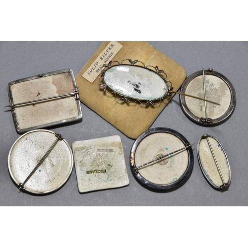 183 - SIX RUSKIN AND RUSKIN STYLE BROOCHES, comprising four Ruskin white metal brooches, two Ruskin style ... 