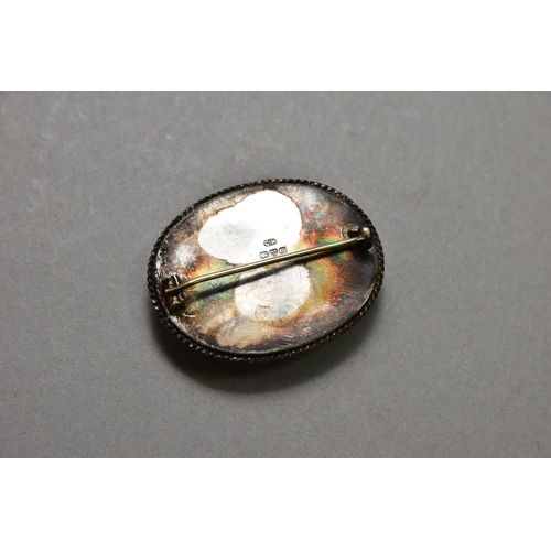 185 - A CHARLES HORNER SILVER BROOCH, set with a Ruskin style enamel plaque, Chester hallmark date 1918, a... 