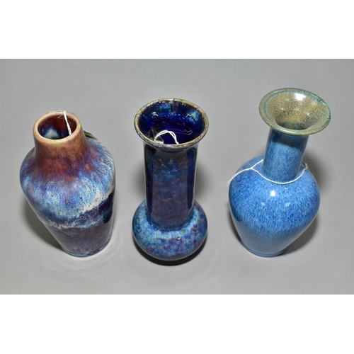 19 - THREE COBRIDGE STONEWARE BLUE GLAZED HIGH FIRED VASES, comprising a bulbous shaped vase with flared ... 