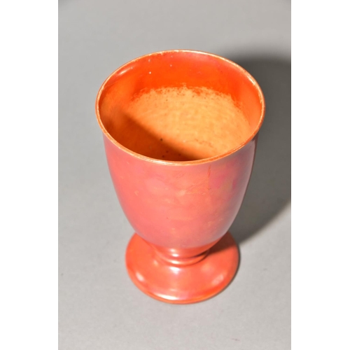 193 - RUSKIN POTTERY, an orange lustre glaze footed goblet, impressed Ruskin England to base, no visible d... 