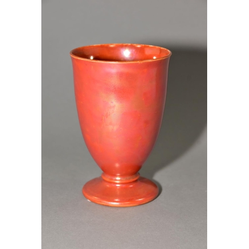 193 - RUSKIN POTTERY, an orange lustre glaze footed goblet, impressed Ruskin England to base, no visible d... 