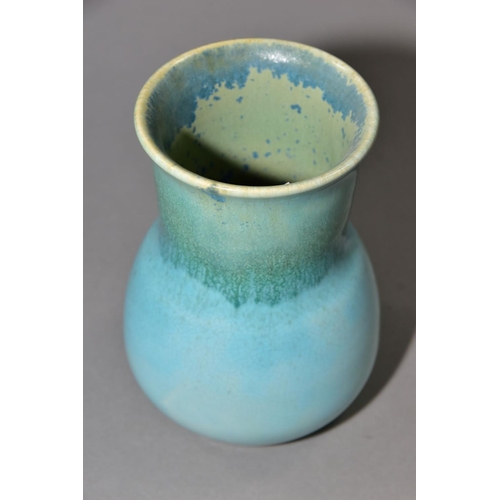 200 - RUSKIN POTTERY, a turquoise globe and shaft vase, blue crystalline glaze to the interior, impressed ... 