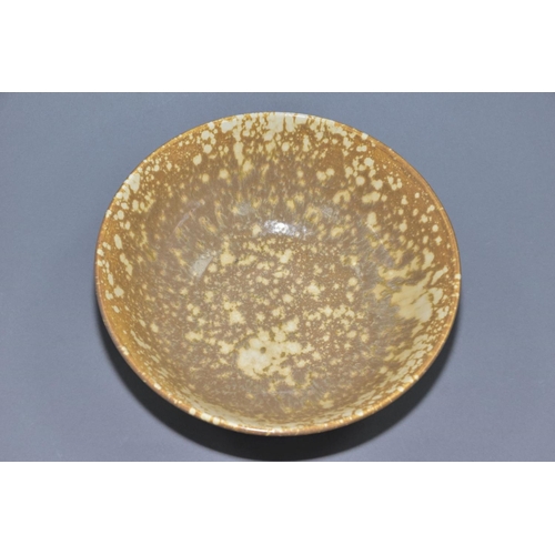 201 - RUSKIN POTTERY, a brown and cream mottled glaze bowl, impressed Ruskin England to the base, height a... 