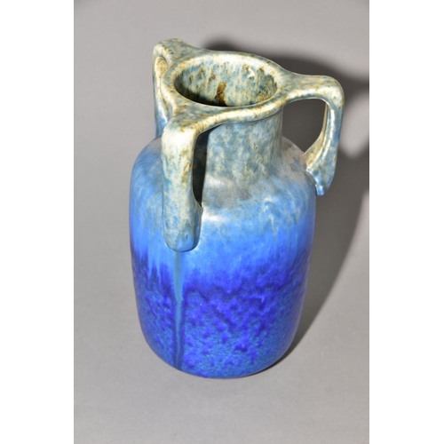 205 - RUSKIN POTTERY, a three handled bottle shaped vase, mottled green fading to blue glaze, inscribed W.... 