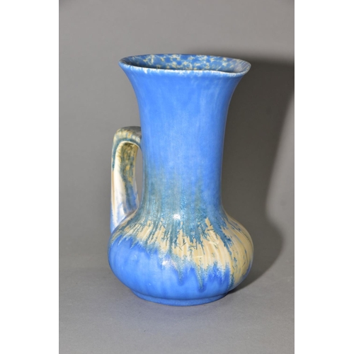 207 - RUSKIN POTTERY, a water jug of onion form, covered in blue crystalline white and cream glazes, impre... 