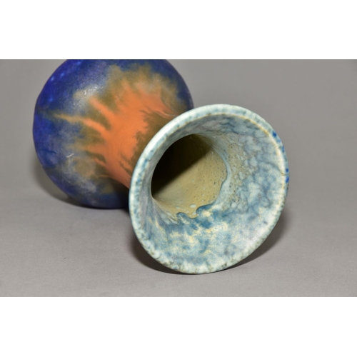 209 - RUSKIN POTTERY, an onion shaped vase covered in bands of green, orange and blue glaze, impressed Rus... 