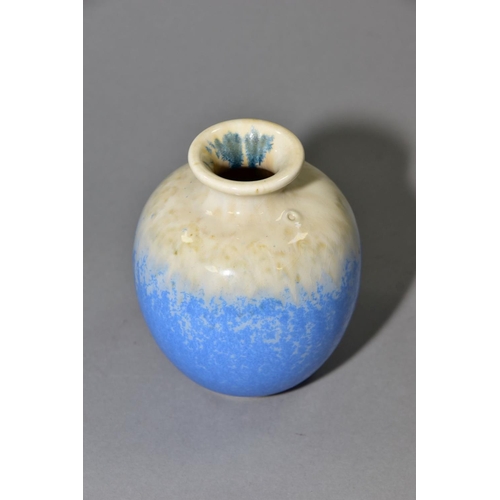 216 - RUSKIN POTTERY, a globular vase with blue crystalline and cream glazes, impressed Ruskin England, in... 