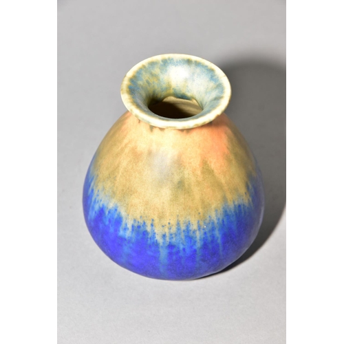 217 - RUSKIN POTTERY, a conical vase with flared rim, bands of orange, green and blue glaze, approximate h... 