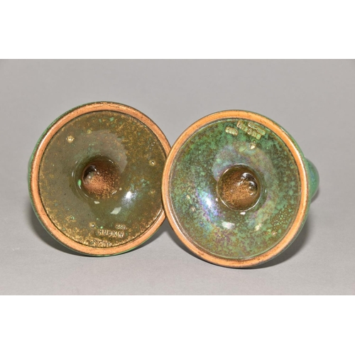 218 - RUSKIN POTTERY, a pair of candlesticks covered in green tea dust glaze, inscribed Ruskin England 192... 