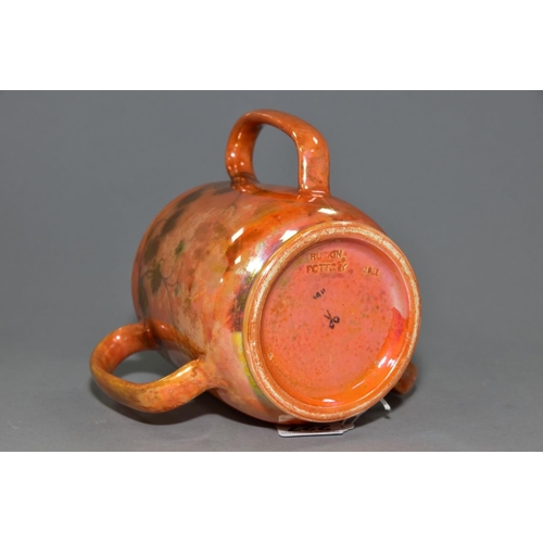 227 - RUSKIN POTTERY, a three handled tyg decorated in orange lustre with a band of underglazed foliate de... 