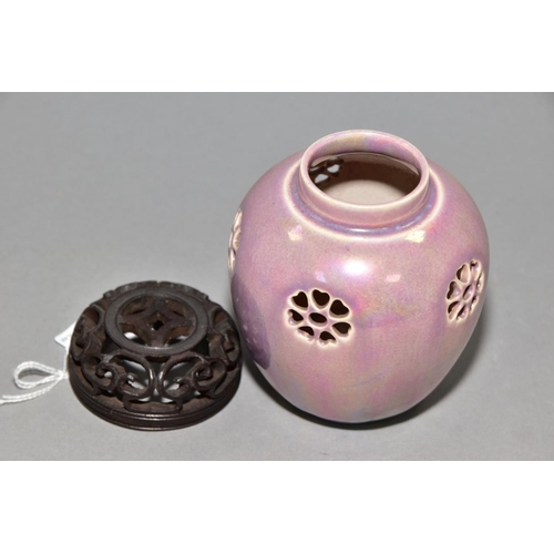 229 - RUSKIN POTTERY, a pink lustre reticulated ginger/pot pourri jar, pierced flowers with heart shaped p... 