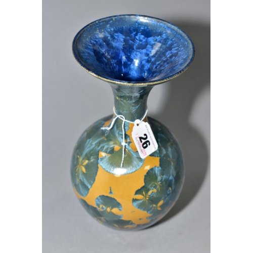 26 - A SIMON RICH (BORN 1949) STUDIO POTTERY CRYSTALLINE GLAZED BOTTLE VASE, wide flared rim, ochre groun... 