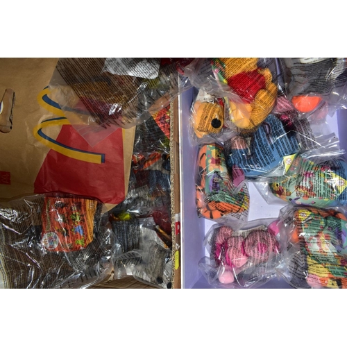 52 - THREE BOXES OF MCDONALDS HAPPY MEAL TOYS, the majority sealed in bags, themes comprising Lego Basic ... 