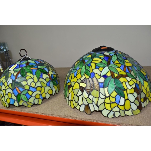 54 - A GROUP OF LAMP BASES, GLASS LIGHT SHADES, CANDLE HOLDERS, etc, comprising two coloured leaded glass... 