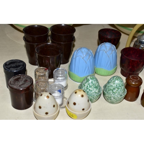 66 - A SMALL COLLECTION OF BAKELITE AND PLASTIC CRUETS, EGG CUPS, etc, a pair of Royal Staffordshire Cera... 