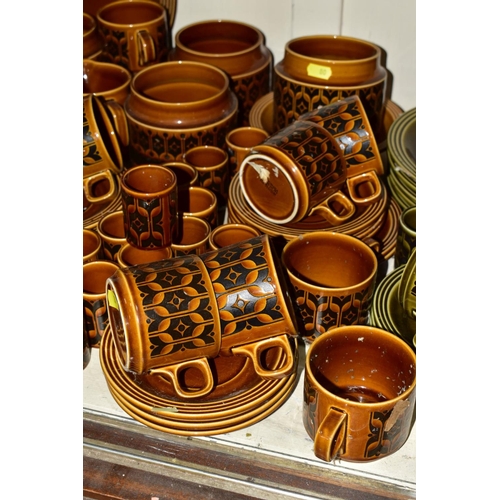 80 - A QUANTITY OF HORNSEA HEIRLOOM PATTERN BROWN GLAZED WARES, including seven storage jars (all lacking... 