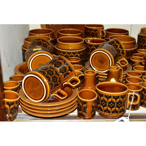 80 - A QUANTITY OF HORNSEA HEIRLOOM PATTERN BROWN GLAZED WARES, including seven storage jars (all lacking... 