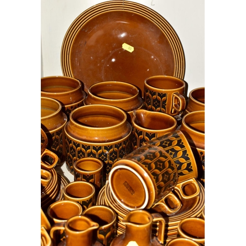 80 - A QUANTITY OF HORNSEA HEIRLOOM PATTERN BROWN GLAZED WARES, including seven storage jars (all lacking... 