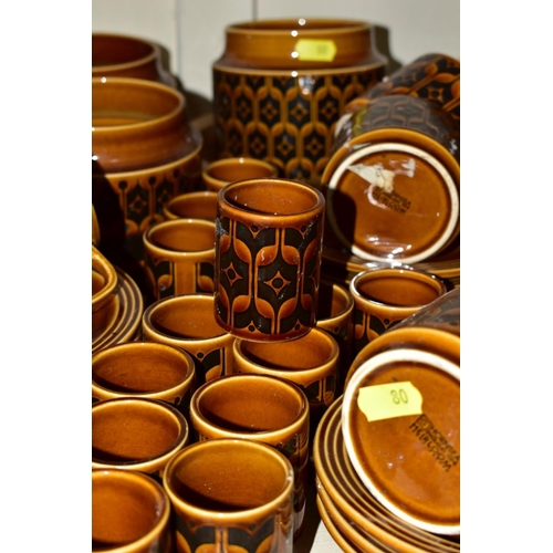 80 - A QUANTITY OF HORNSEA HEIRLOOM PATTERN BROWN GLAZED WARES, including seven storage jars (all lacking... 