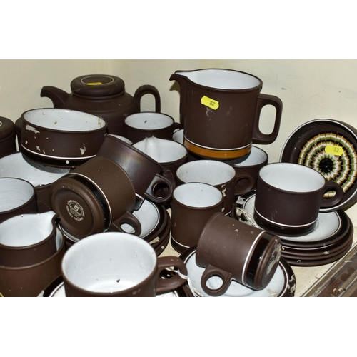 82 - A QUANTITY OF HORNSEA CONTRAST PATTERN TEA WARES, including two teapots, a large jug, cups, saucers ... 