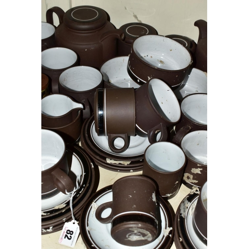 82 - A QUANTITY OF HORNSEA CONTRAST PATTERN TEA WARES, including two teapots, a large jug, cups, saucers ... 