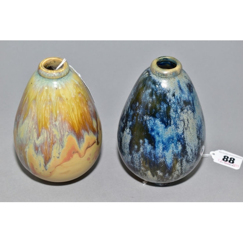 88 - TWO SEVRES STUDIO POTTERY VASES of swollen ovoid form, mottled and streaked glazes, indistinct signa... 