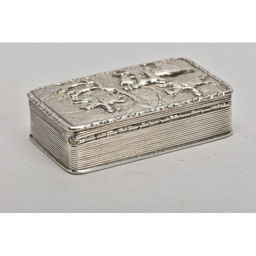 125 - A SILVER TABLE SNUFF BOX, embossed fox hunting scene to the lid, engine turned design to the sides a... 