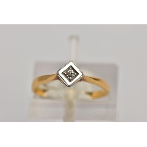 131 - A YELLOW METAL SINGLE STONE DIAMOND RING, misshapen shank, set with a single cut diamond, within a s... 