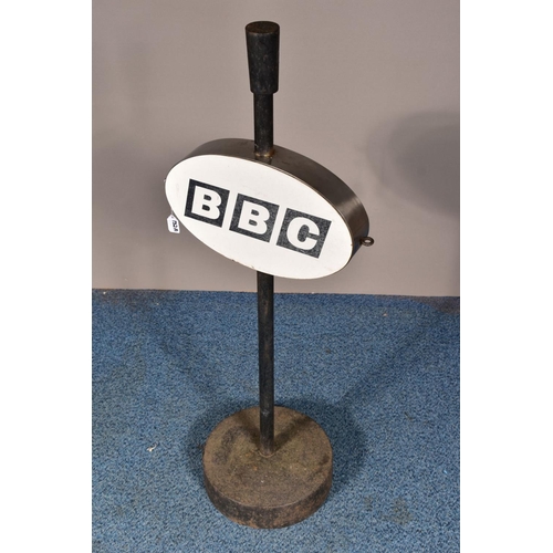 132A - A 'BBC' SIGN, on a cast iron stand and circular base, height 109cm