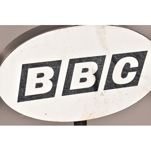132A - A 'BBC' SIGN, on a cast iron stand and circular base, height 109cm