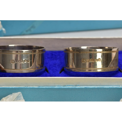 153 - A SINGLE SILVER TEASPOON AND THREE CASED SETS OF NAPKIN RINGS, the teaspoon with a tapered reeded st... 