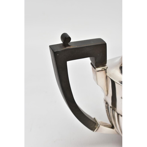 161 - A LATE VICTORIAN SILVER TEAPOT, tapered stop reeding design to the body and spout, ebonised handle a... 