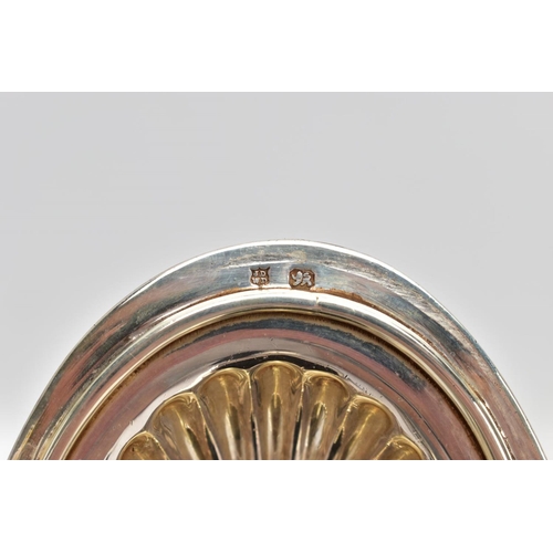 161 - A LATE VICTORIAN SILVER TEAPOT, tapered stop reeding design to the body and spout, ebonised handle a... 