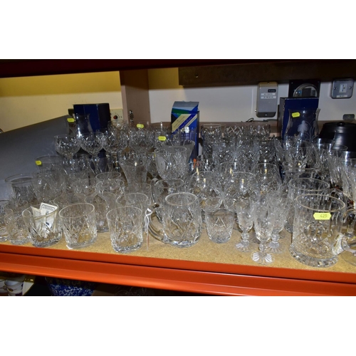 425 - MORE THAN SEVENTY PIECES OF CUT GLASS AND CRYSTAL, including vases, stemware, tumblers and tankards,... 