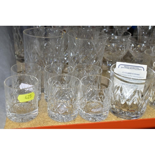 425 - MORE THAN SEVENTY PIECES OF CUT GLASS AND CRYSTAL, including vases, stemware, tumblers and tankards,... 