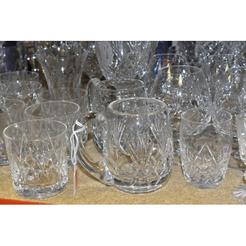 425 - MORE THAN SEVENTY PIECES OF CUT GLASS AND CRYSTAL, including vases, stemware, tumblers and tankards,... 