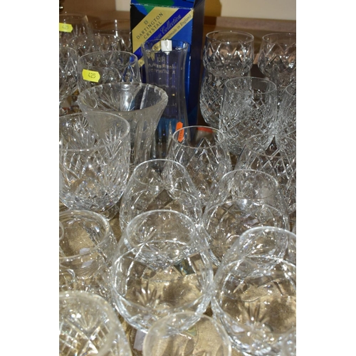 425 - MORE THAN SEVENTY PIECES OF CUT GLASS AND CRYSTAL, including vases, stemware, tumblers and tankards,... 