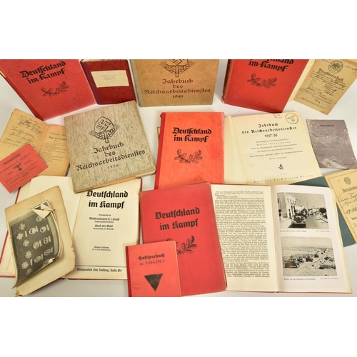 100 - A BOX CONTAINING A NUMBER OF GERMAN 3RD REICH WWII BOOKS to include 6 copies of 'Deutchland im Kampf... 