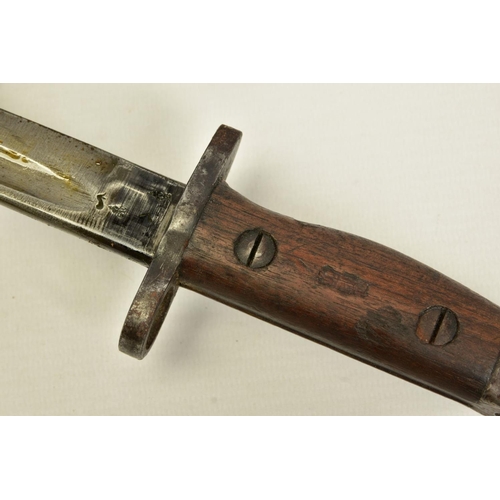 107 - A BRITISH  SMLE WWII ERA RIFLE BAYONET with scabbard and three canvas frogs attached, two x sand and... 