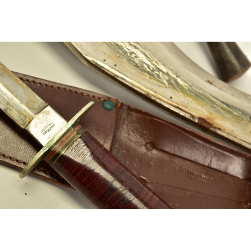 110 - A NON MARKED KUKURI KNIFE AND SCABBARD, poor condition, together with a 60's - 70's camping knife an... 