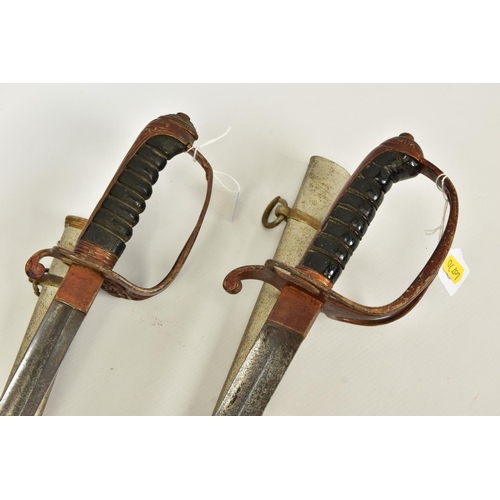 118 - TWO x EXAMPLES OF 1945 PATTERN VICTORIAN INFANTRY SWORDS with metal scabbards, blade lengths approxi... 