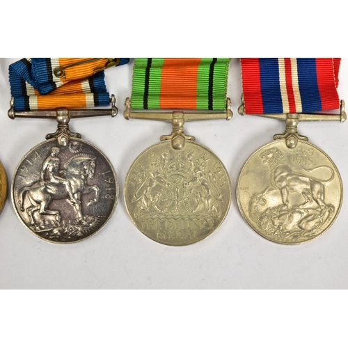 128 - A WWI BRITISH WAR AND VICTORY MEDALS named to 26930 Pte W.H.Hails, Dorset Reg't, together with WWII ... 