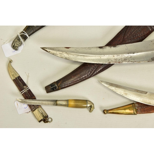 136 - FIVE x EXAMPLES OF MIDDLE EASTERN/ARABIC HAND DAGGERS. some are more ornate than others, some well c... 