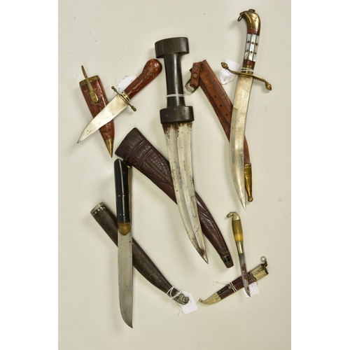 136 - FIVE x EXAMPLES OF MIDDLE EASTERN/ARABIC HAND DAGGERS. some are more ornate than others, some well c... 